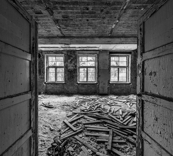 Room strewn with floorboards
