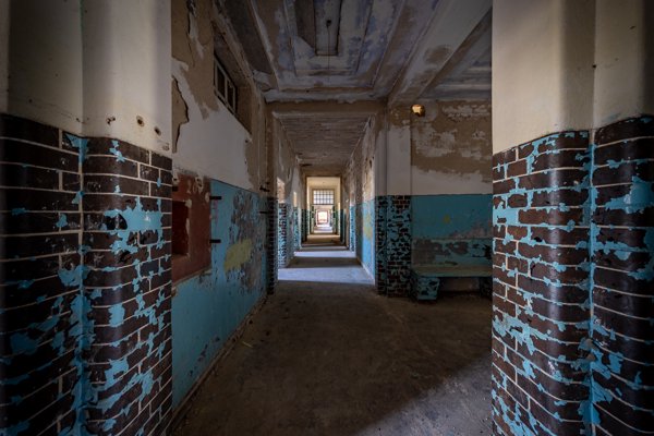 Long corridor with blue tiles