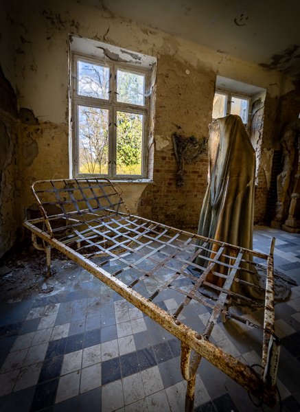 Bed frame beneath the window