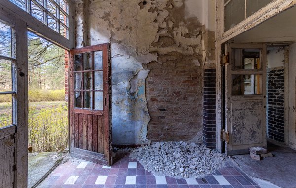 Fallen plaster by the doors
