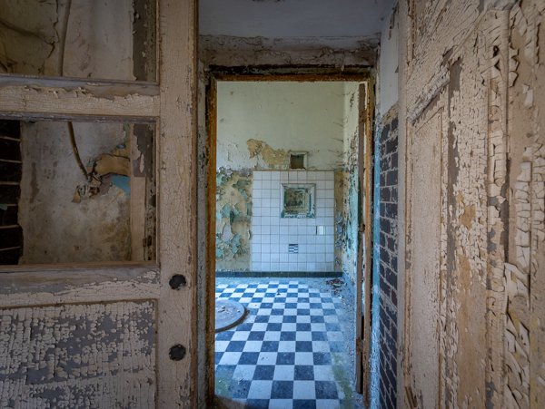 Chequered floor through a doorway