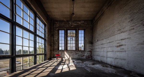 Window bays along an empty hall