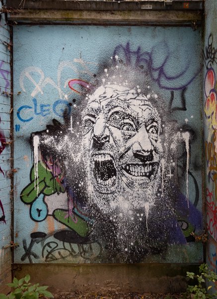 Screaming face in spray paint