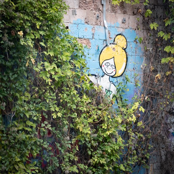 A figure overgrown with ivy