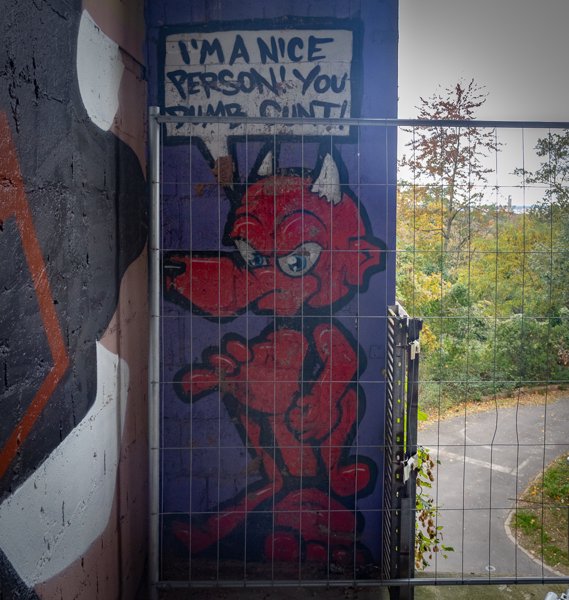 Red devil on the stairwell