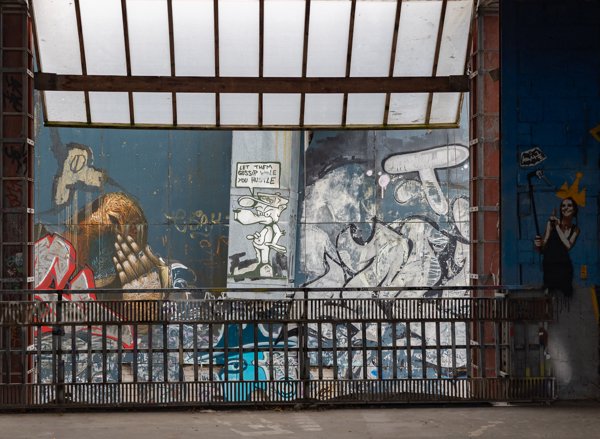 Murals beneath a glass roof