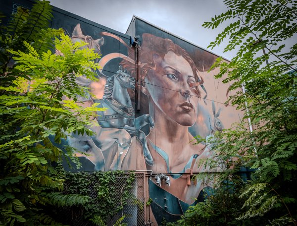 Mural rising above the trees